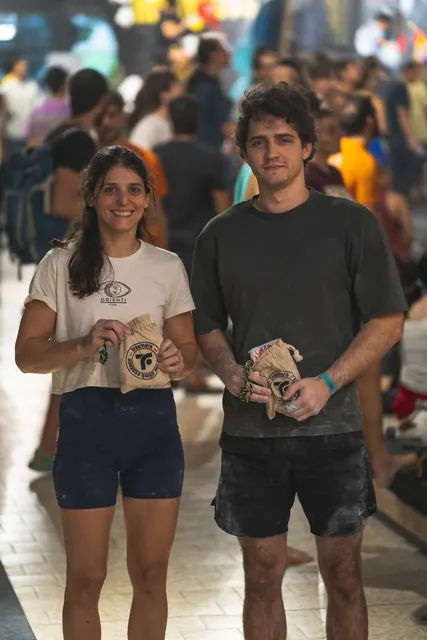 Two winners posing with their prizes.